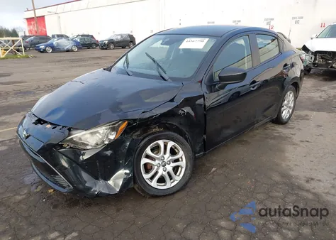 2018 Toyota Yaris Ia из США, поврежденный, VIN 3MYDLBYV2JY301933